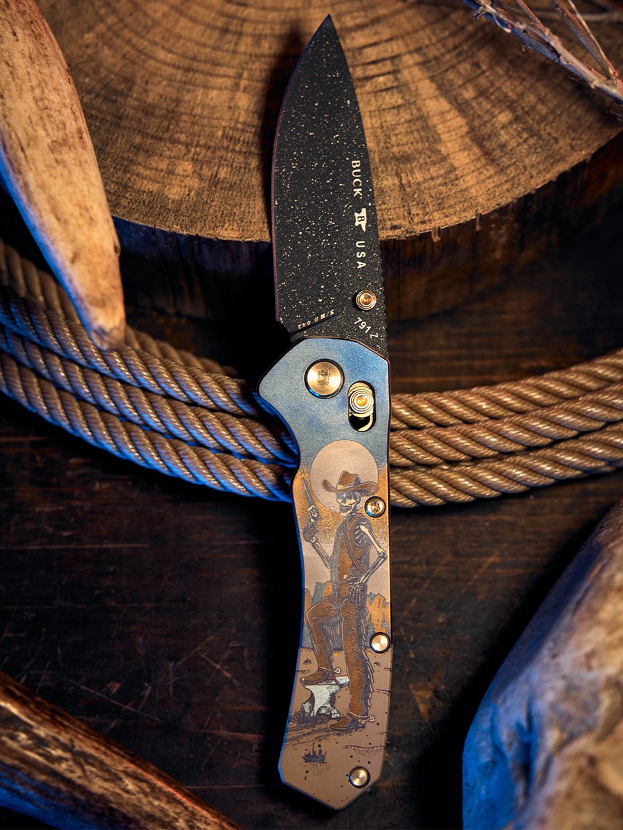 BuckKnives1902's tweet photo. An extremely unique limited release is here: the 791 Range Elite “Bones on the Range.”

This exclusive build features a BOS heat-treated MagnaCut drop point blade with a Cobalt Cerakote desert scene etching, a solid brass thumbstud, and a machined titanium handle by LynchNW with Cerakoted and anodized “Bone Ranger” artwork. A titanium spacer with bandolier anodizing, brass PVD fasteners, and a titanium pocket clip complete the build. 

Designed in collaboration with Colorful Filth, Northern Knives, and LynchNW, this is a one-of-a-kind take on the Range Elite. There are fewer than 100 left, grab yours now: https://t.co/YM6kobiRRK