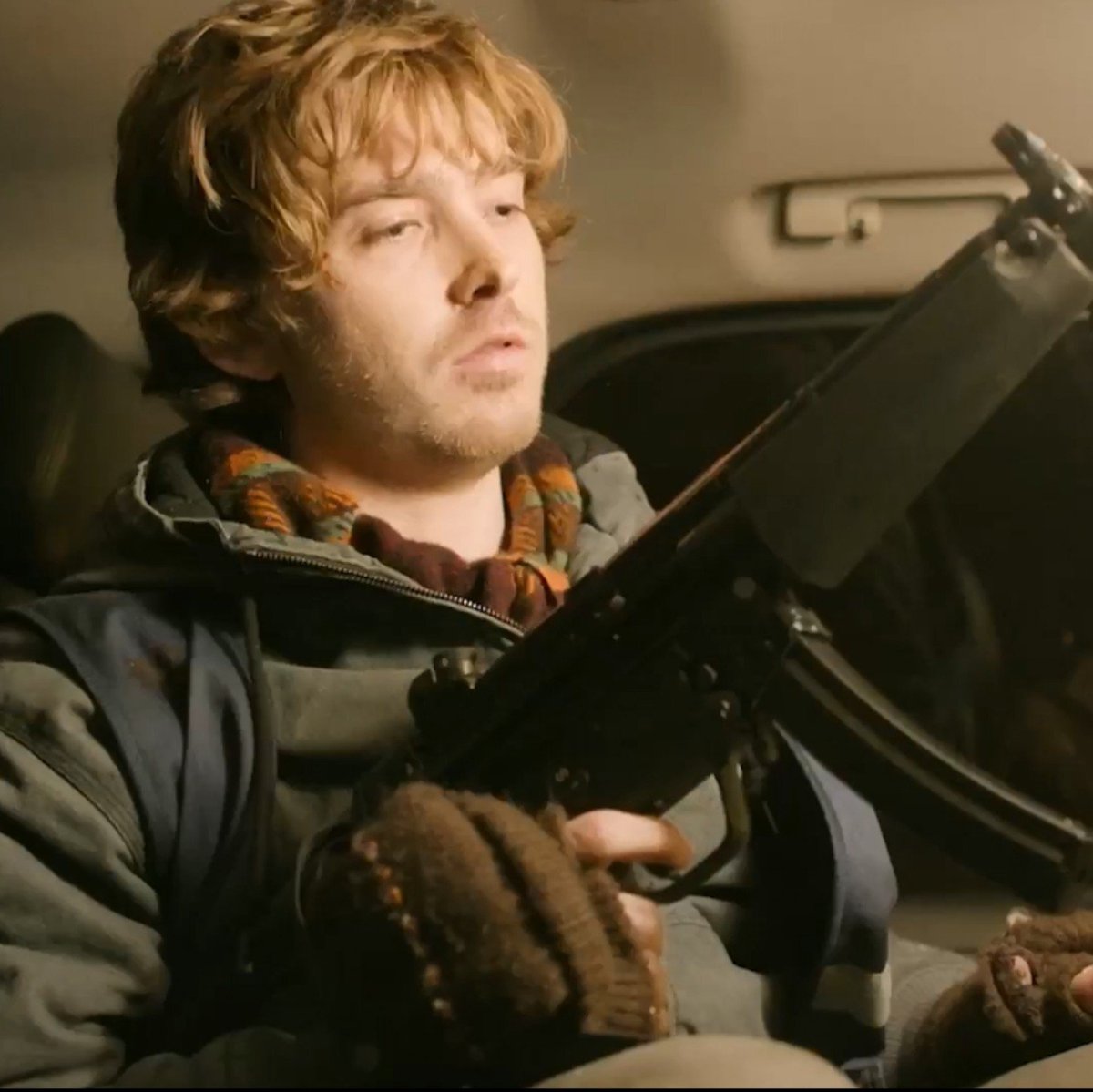 astrophagecake's tweet photo. he looks so cool here you wouldn't even think he's pretty much accidentally shooting up a car rn https://t.co/j87RjwI8tW