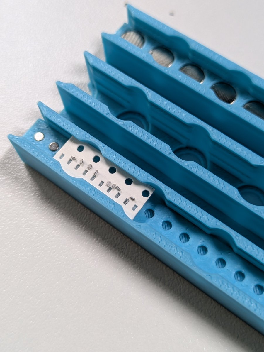 pikkoloassembly's tweet photo. Tested out magnets for holding 0402 in cut tapes steady and boy does it just make everything worse. https://t.co/HfSePWd4dc