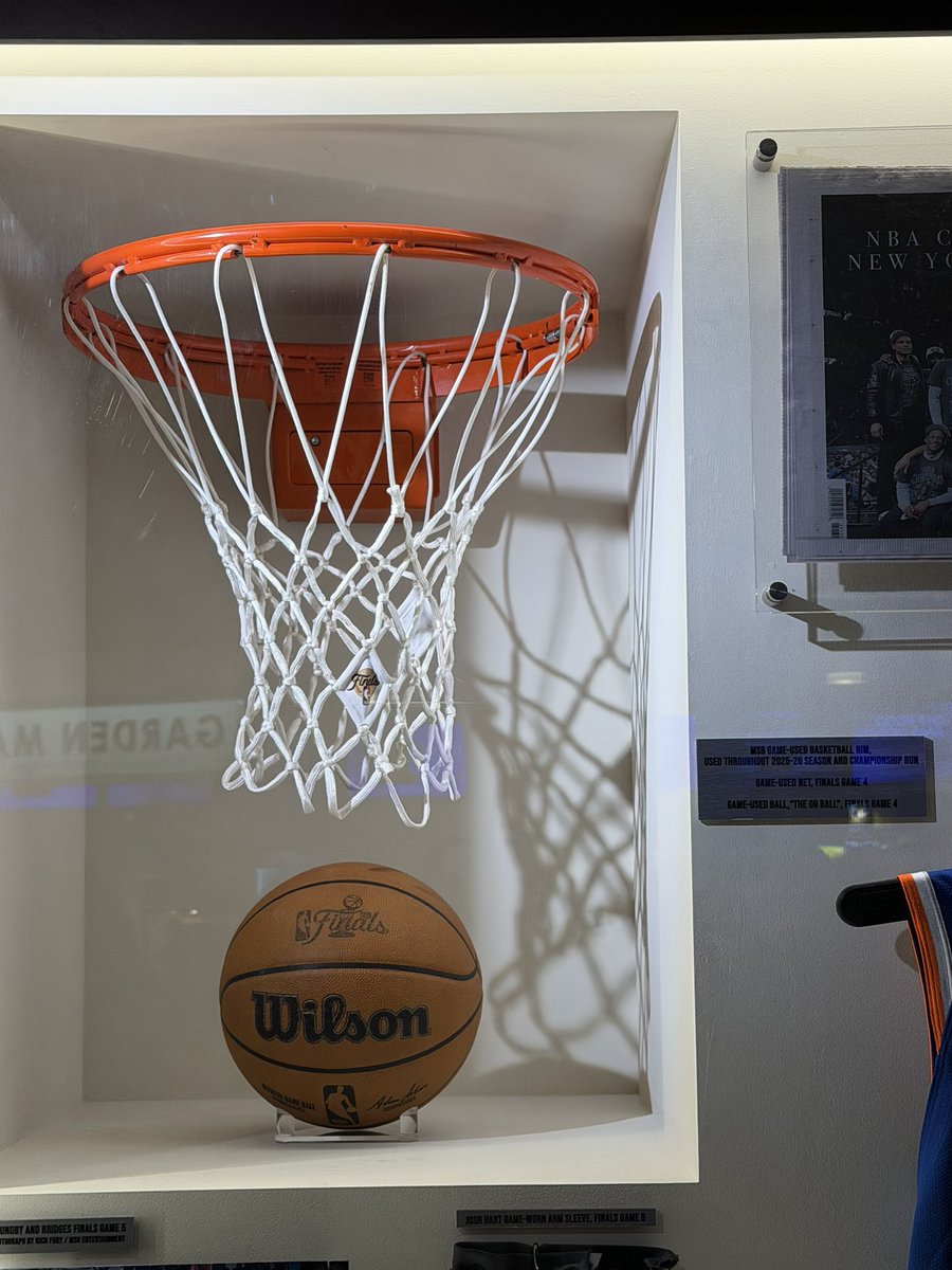 sny_knicks's tweet photo. The Knicks’ championship display outside of section 104 at MSG, featuring the ball OG Anunoby tipped in to win Game 4 https://t.co/gfYqTqDIYw