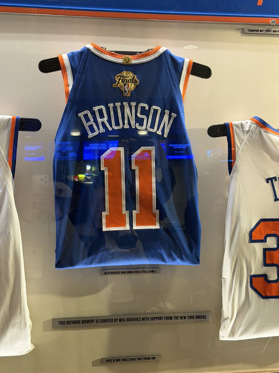 sny_knicks's tweet photo. The Knicks’ championship display outside of section 104 at MSG, featuring the ball OG Anunoby tipped in to win Game 4 https://t.co/gfYqTqDIYw