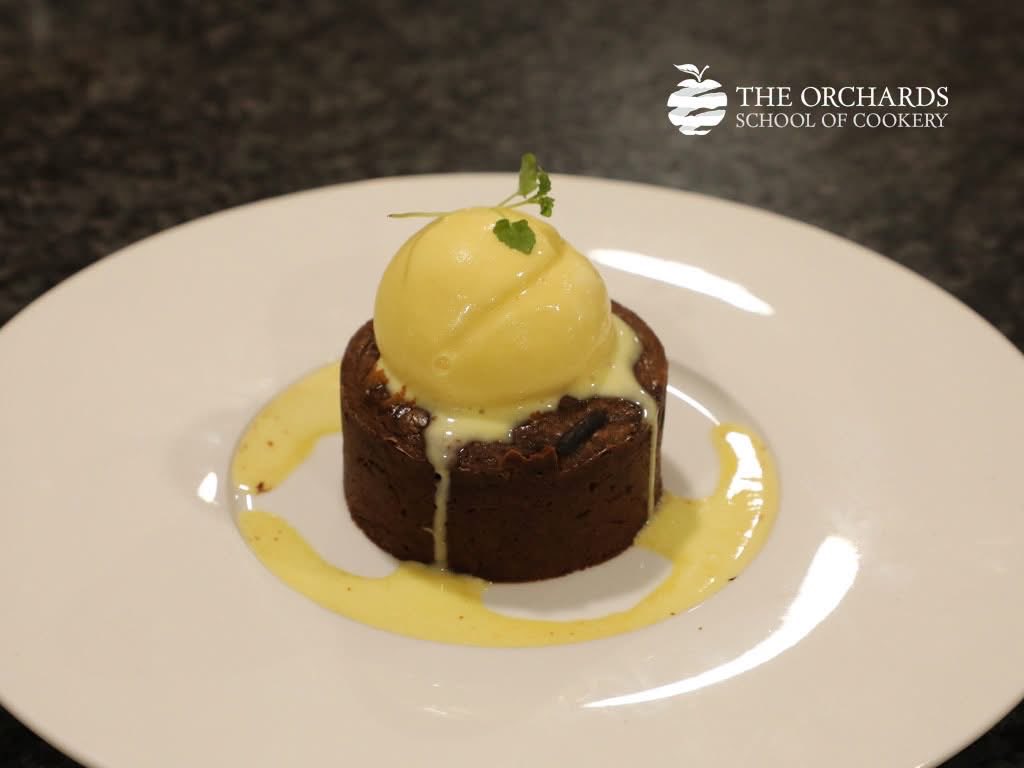 OrchardsCookery's tweet photo. A little rain outside, plenty of cooking inside! 🌧👩‍🍳  Our Chalet Cooks and Orchards Course Students have made crispy Paneed Turkey, golden Baked Camembert and gooey Chocolate Moelleux. 😋 Not a bad way to spend a rainy day! ☺️ https://t.co/Rmjqfj9ugN