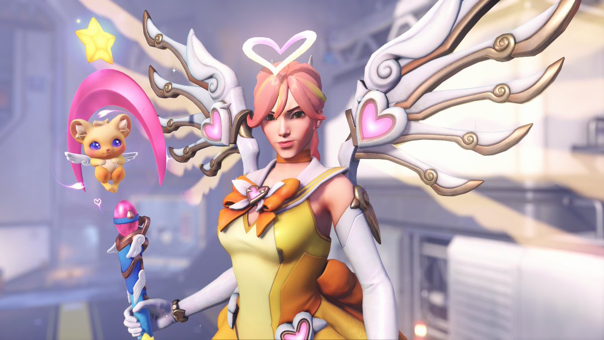 eboymaker's tweet photo. Why Isn't Dokiwatch Mercy an Ultra Skin? 🤔

The reason why Dokiwatch Mercy isn't an Ultra Skin with special effects is that Mercy already has a Mythic Weapon from the same skin line, Dokiwatch.

To experience Dokiwatch Mercy to the fullest, you must own her Dokiwatch Mythic Weapon, which adds custom effects and special animations to her gameplay.

As you can see in the second picture, which is an official image from Blizzard, she's carrying her Dokiwatch Mythic Weapon.

Before buying her new Dokiwatch skin, keep in mind that if you want to experience the full Dokiwatch experience, you'll need to own her Mythic Weapon 😇🐱