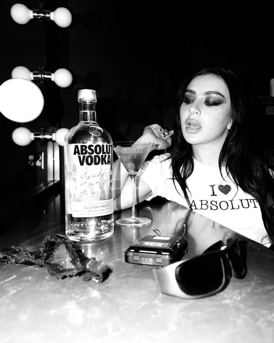 xcxsource's tweet photo. Charli xcx has signed a two-year partnership with Absolut Vodka, promising limited-edition drops, collectible merchandise, custom glassware and fan events.

“When absolut approached me for a collaboration i was immediately down because they told me they wanted to do something a little chaotic – which obviously i love. so yeah, moments with music, martinis, friends and strangers that’s like so my vibe babes”