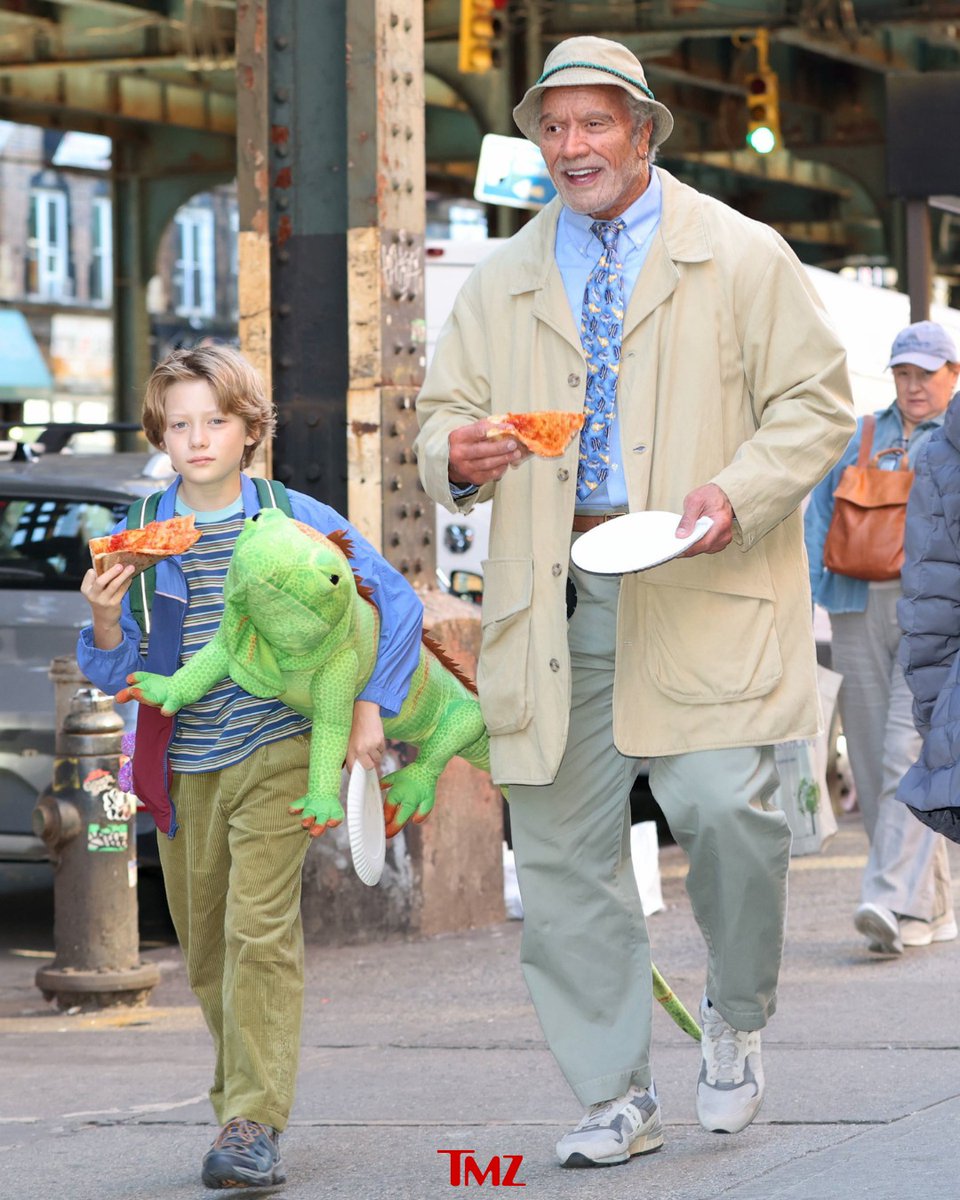 TMZ's tweet photo. 🦎🎶 Dwayne Johnson rocks a new look in New York City alongside child actor Theo Liber on the set of his upcoming film "Lizard Music."

📷: Getty https://t.co/WLbBP2H48v