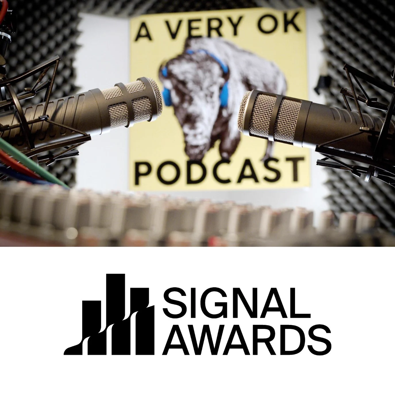 logo for "A Very OK Podcast" is behind two microphones with an audio board in the foreground 