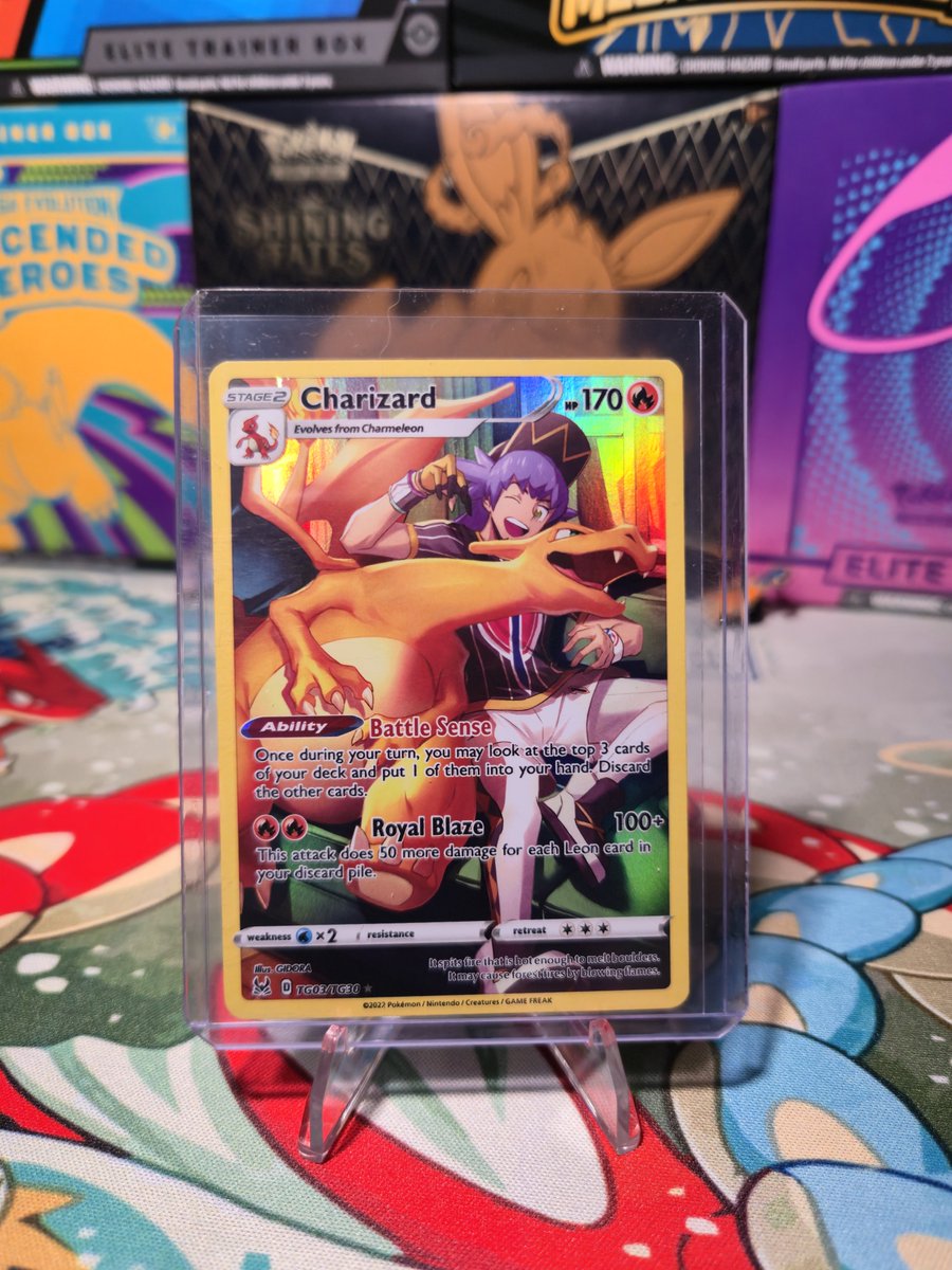 DivisiveContent's tweet photo. Picked up this Charizard in a trade... Leon and Charizard on the Lost Origin Trainer Gallery. The Charizard collection is growing... https://t.co/LjUeGg856u
