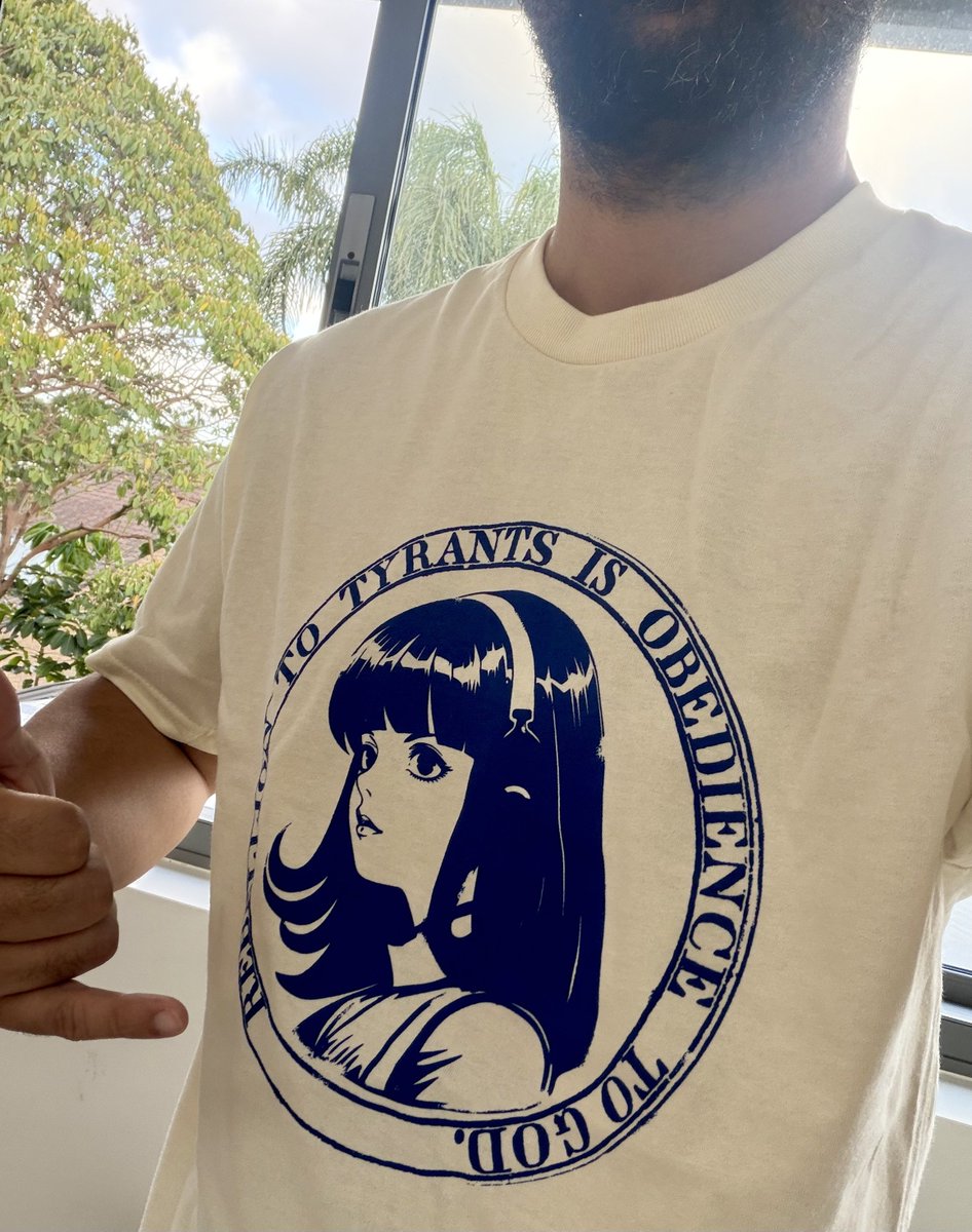 iamlukethedev's tweet photo. Do you know the meaning of the @NousResearch logo?

The girl is called the "Nous Girl". She was drawn in July 2023 by Nous's first artist, who goes by John Galt. Yes, the Atlas Shrugged rebel

She stands for the rebellion of decentralized AI, and for keeping our humanity in the face of censorship and machine intelligence

The words around her: "Rebellion to tyrants is obedience to God."

That line goes back to 1776. Jefferson, Franklin and Adams put it on their proposed Great Seal of the United States. Congress said no, so Jefferson put it on his own personal seal instead

Nous pointed it at AI. Today's tyrants are closed labs and gatekeepers deciding who gets access to intelligence. The rebellion is open weights, open agents and open infrastructure.

That's why I build on Hermes

Wearing it proudly 🏴