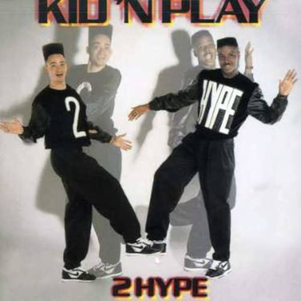 landofthe80s's tweet photo. On this date in 1988, Kid 'N Play released their debut studio album, "2 Hype." 

BITE-SIZED FACT | The hip-hop duo became known for their energetic performances, colorful style and signature high-top fade haircuts, later bringing their personalities to the big screen in "House Party." #80s