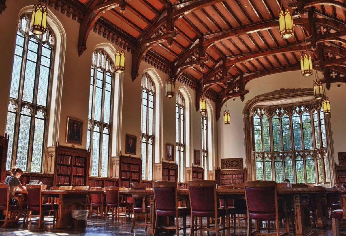 BookChat_'s tweet photo. This is the "Great Reading Room" in Bizzell Memorial Library at the University of Oklahoma, where I earned my undergraduate degree. The bookcases along the sides of the room are filled with printed and bound copies of the dissertations of the university's PhD students. It's an extremely impressive room to walk through. It's an inspiring room and I tried studying there a few times, but it turns out I'm much more of a "hidden corner of the stacks" sort of person. 

Construction on the original part of Bizzell Memorial Library began in 1927 and was completed in 1929. One major addition was added in 1958 and a more recent expansive addition in 1982.
