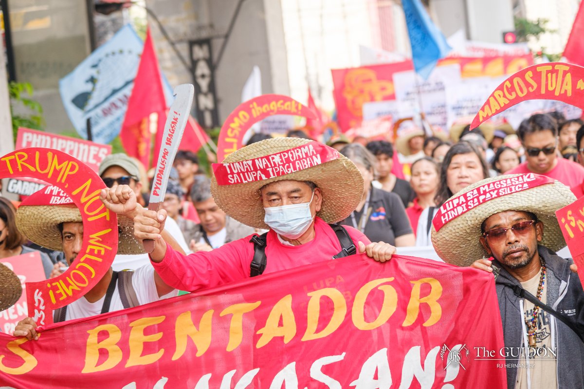 TheGUIDON's tweet photo. IN PHOTOS: Hundreds of agricultural workers, alongside multisectoral organizations, held a rally near the Mendiola Peace Arch to protest against rural displacements today, October 21, in line with the National Protest Day for Peasant Month. This mobilization concludes the week-long camp out protest which began last October 15.  

Led by the Kilusang Magbubukid ng Pilipinas, groups gathered along España Boulevard and marched toward the Mendiola Peace Arch. Performances and speeches took place throughout the program—uniting their calls for a genuine land reform, and condemning large-scale land use for energy farms and the Pax Silica. Moreover, protesters demanded accountability from the Marcos regime for the Toboso-19 killings.  

Photos by RJ Hernandez