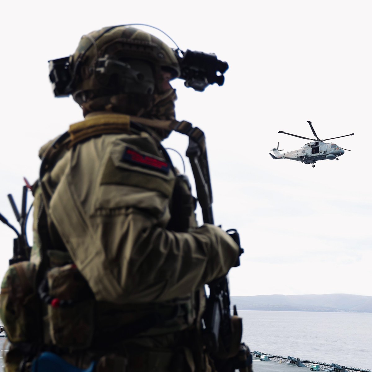 DefenceOps's tweet photo. ⚓ Making an entrance the commando way

@RoyalMarines boarded German warship FGS Berlin by air and sea during Exercise Strike Warrior, sharpening their skills alongside @NATO allies.

🛡️Training together to defend together.

#ExStrikeWarrior #SW26 https://t.co/F2D1ya5Mhf