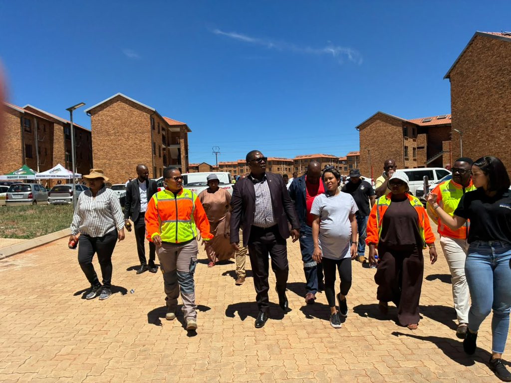 DawggIV's tweet photo. A house is more than four walls. For the qualifying beneficiaries at Elijah Barayi, it means dignity, greater security, and a foundation to plan the future. That's the real story behind the more than 200 houses being handed over in Merafong. #GautengHumanSettlements #GrowingGautengTogether