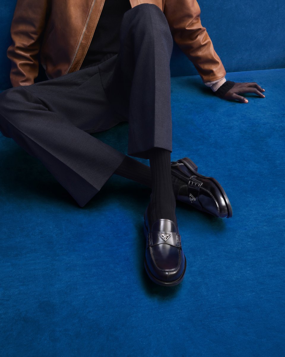 Prada's tweet photo. A classic, constantly reconsidered. 
Since the 1980s, Prada Signature Loafers have evolved through unexpected material combinations, distinctive hardware and new sole proportions. Each interpretation offers a different perspective while preserving the design's enduring identity.  
Discover more: https://t.co/AeAwlwekBV

#PradaHoliday #PradaGifts #Prada
