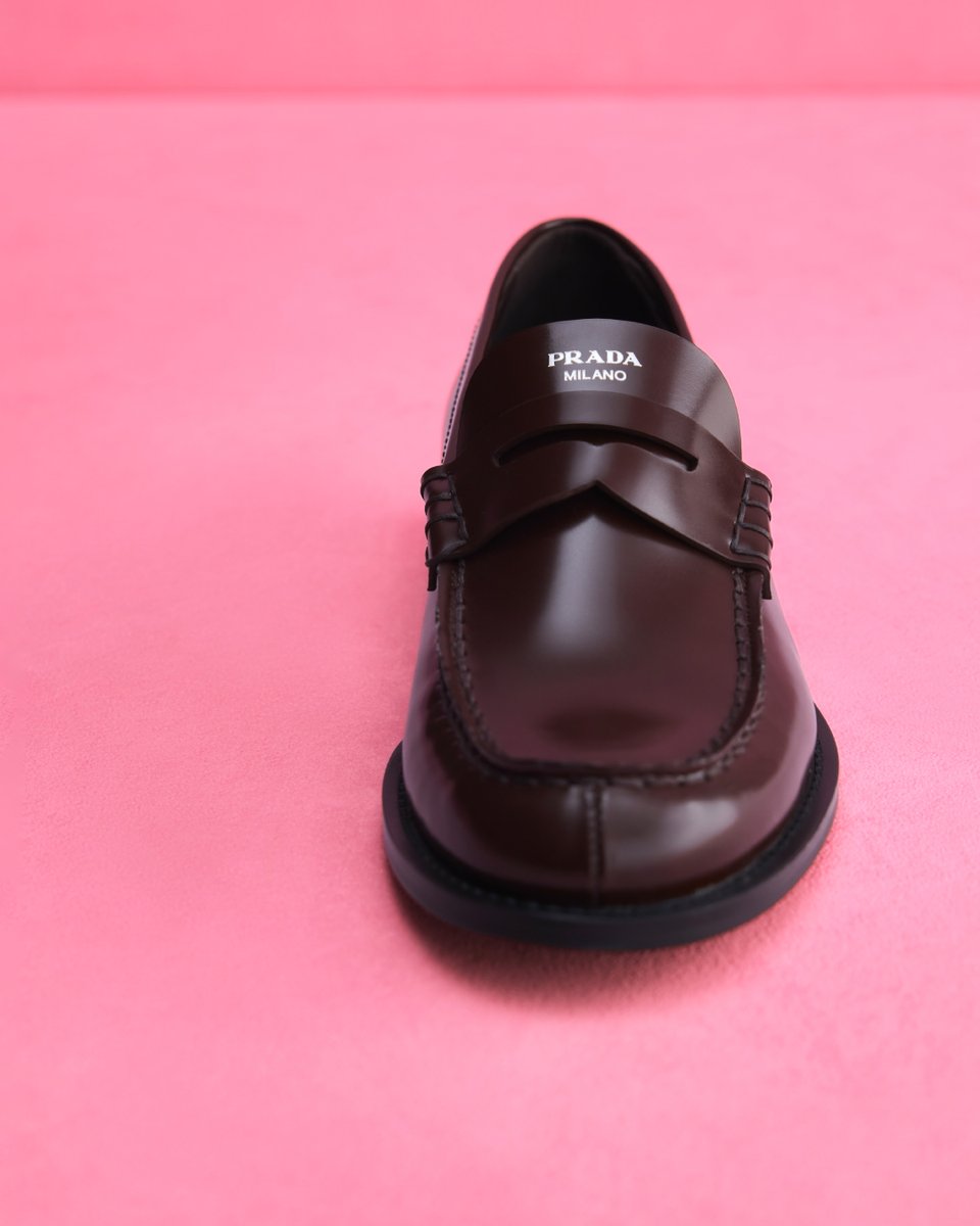 Prada's tweet photo. A classic, constantly reconsidered. 
Since the 1980s, Prada Signature Loafers have evolved through unexpected material combinations, distinctive hardware and new sole proportions. Each interpretation offers a different perspective while preserving the design's enduring identity.  
Discover more: https://t.co/AeAwlwekBV

#PradaHoliday #PradaGifts #Prada