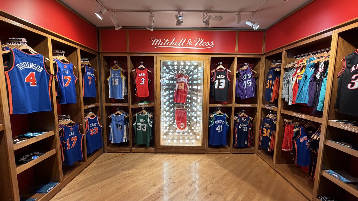 ZachCohenFB's tweet photo. I will say, the one place I try to stop by every time in NYC is the NBA Store

Wish there was an NFL Store just so they can have a wall of throwbacks like these https://t.co/LDKMhpHPGe
