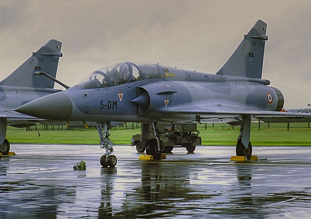 OnDisasters's tweet photo. A French Mirage 2000D two seater crashed yesterday near Nancy AFB. One of the two crew was killed, the other was able to eject. First reports state accident occured on approach, under severe weather, during a training mission.  📸 crusader752 via Flickr https://t.co/HEz9vwu4Zc