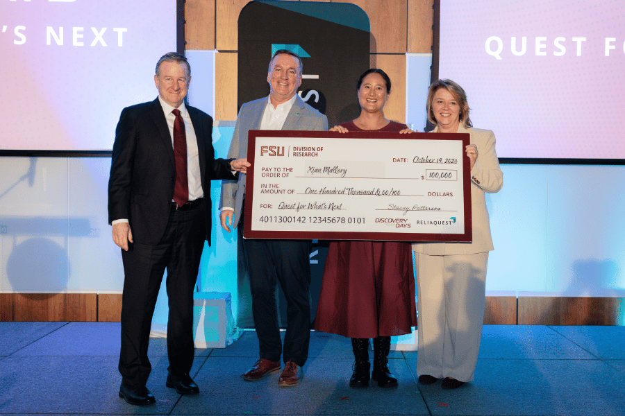 FloridaState's tweet photo. During the “The Quest for What’s Next!” competition at #FSUDiscoveryDays on Oct. 19, Department of Computer Science Assistant Professor Xian Mallory presented Sage to a panel of judges. Her pitch beat five other teams competing for the grand prize aimed at pursuing innovative projects in artificial intelligence and cybersecurity. 

The competition grew from an AI and cybersecurity partnership launched by FSU and @ReliaQuest in spring 2026 to accelerate research and real-world innovation.

Read more at https://t.co/1ES8VlUBw4
