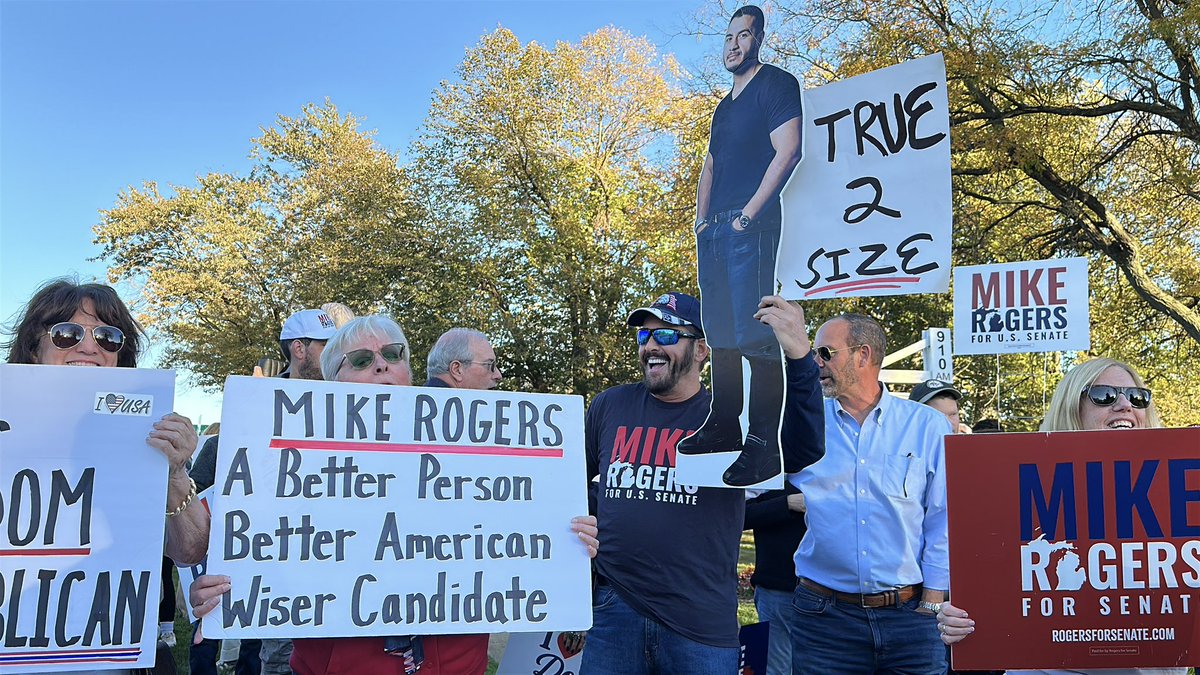 aaronlarnavarro's tweet photo. 📍Southfield, Mich. 

The scene outside the last Michigan Senate debate. Lots of Rogers supporters/signs. 

Also, what seems to be an inflatable Jeffrey Epstein. https://t.co/cJTO8wOK2k