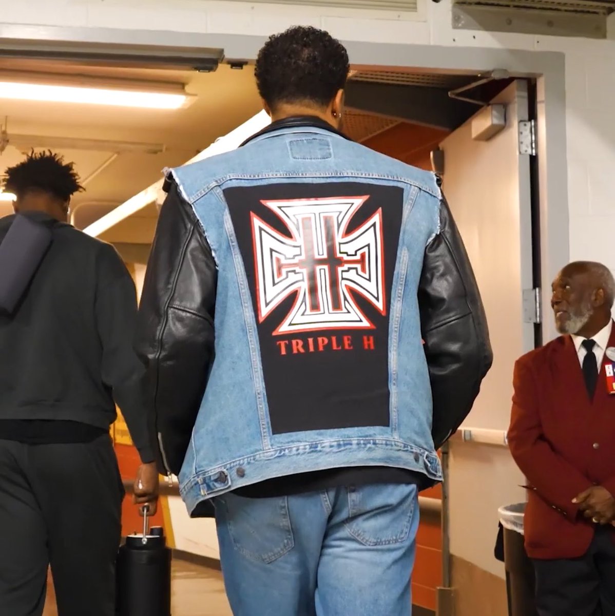 Fightful's tweet photo. Tyrese Haliburton showed up to the Indiana Pacers' opening game in Triple H's 2002 return at MSG outfit. https://t.co/bqCMGnfciX