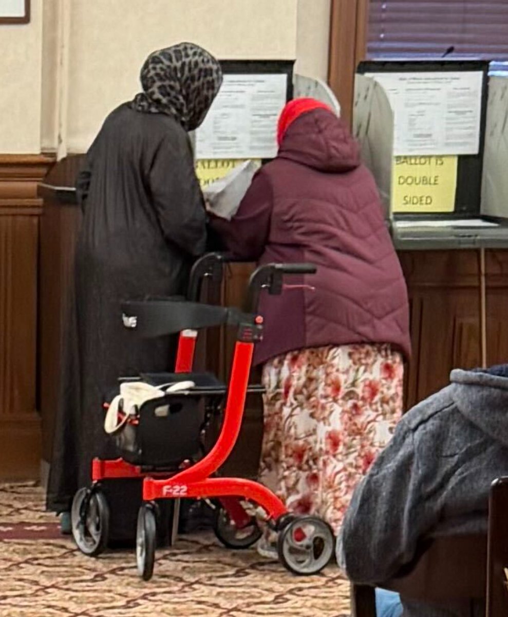 TheMaineWire's tweet photo. LEWISTON: NGOs drop elderly Somalis off at town hall

-Translator meets them at the door

-NGOs + translator escort them to the chamber

-Translator physically "helps" them vote

-NGO coordinator threatens press who document the process https://t.co/vLEGxiEk4G