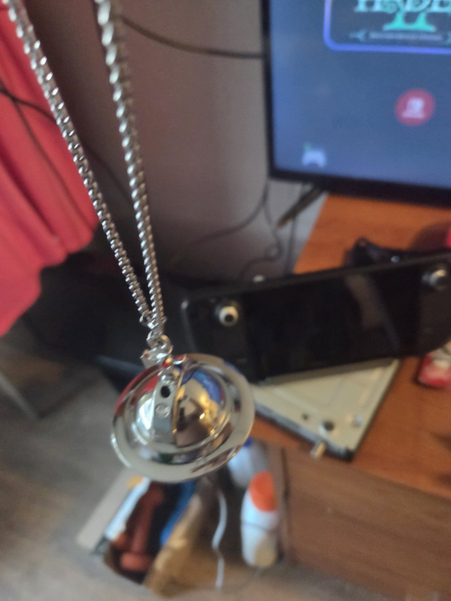 FatherBluechi's tweet photo. Got my girl gifts some collectors items. The orb lighter necklace from NaNa and the hello kitty Gameboy color https://t.co/UeJbRTEMcF