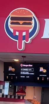 iGrandTheftAuto's tweet photo. Sadly it doesn’t look like Rockstar are building their own burgers. 

Burger Shot appears to be a rebrand of Skinny Louie’s, with a "Skinny Louie’s Cheeseburger Combo" still visible on the menu board. 

Still cool as hell though! 🍔

#GTAVI https://t.co/shJxPK1Cw9