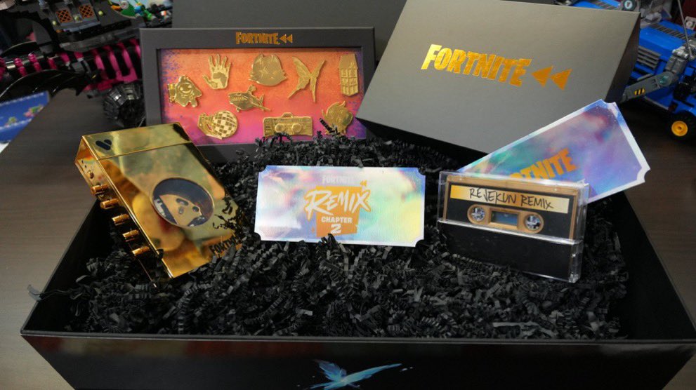 SentinelCentral's tweet photo. Epic Games had begun to tease #Fortnite CH2Remix 2 years ago ⏪ 

Similar to how OG was promoted, several content creators received a package with 9 golden pins, a cassette tape, a remixed Spies! cover by Marshmello, and other goodies. https://t.co/qjjNtONHRn