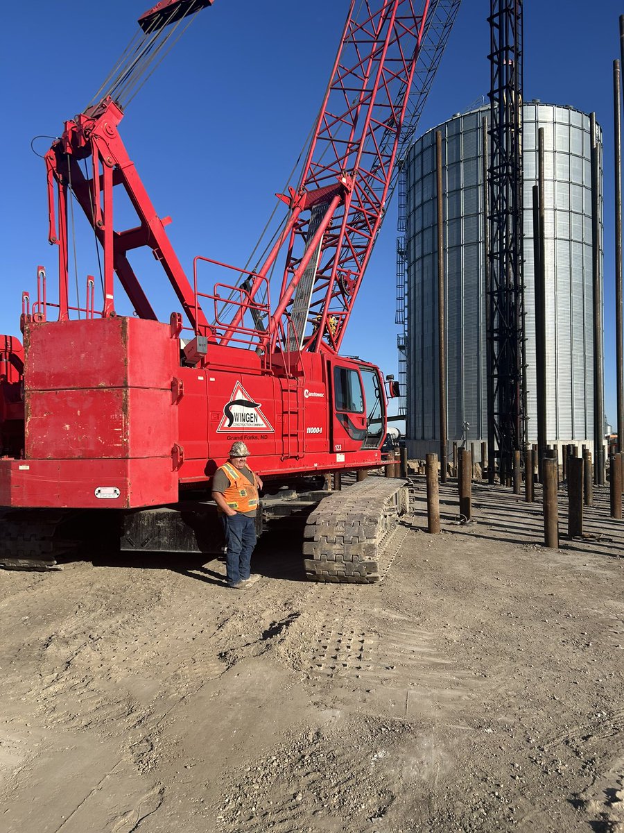 49Local's tweet photo. Member Clarence Allard with Swingen Construction working on new grain bins in Halstad, MN. #operatingengineers #heavyequipment https://t.co/MEw0BdVETz