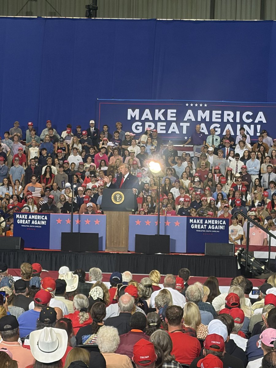 alaynatreene's tweet photo. We’re roughly an hour into the president’s remarks here in SC tonight & Trump has been interrupted by at least 12 protestors so far. They’ve screamed:

“F*** you!”
“Traitor!”
“You’re a criminal!”

POTUS has brushed them off with jokes & applauded law enforcement who have been quick to rush them out