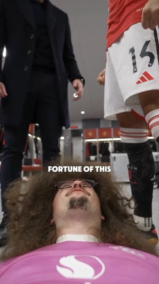 A low-angle sports hallway scene shows a person lying on the floor beneath soccer-uniformed players, with bold white overlay text reading “FORTUNE OF THIS.”