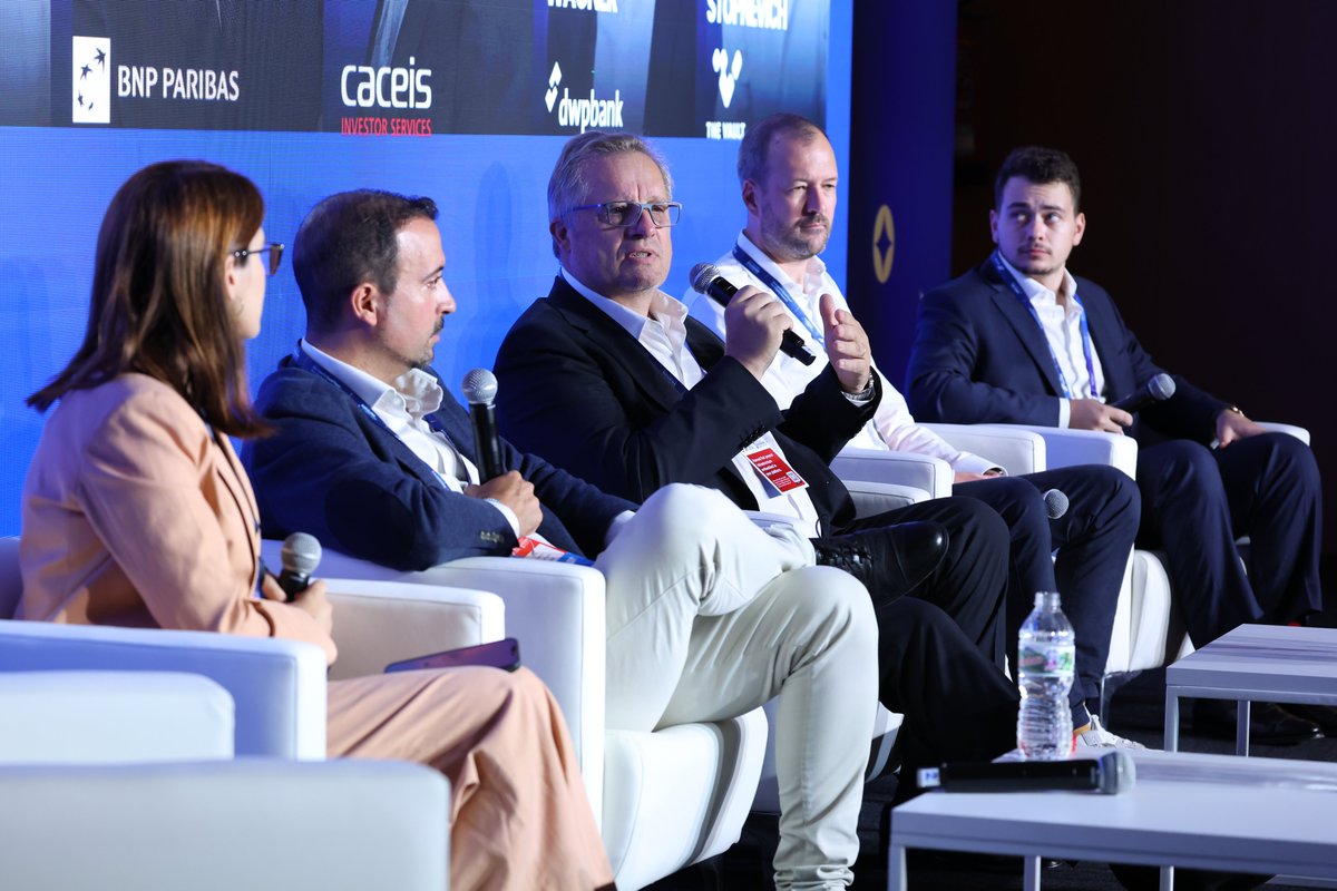 EBlockchainCon's tweet photo. Tokenized funds raise a simple but critical question: who actually holds the asset?

At EBC12, @enevamaria (@TreverGmbH), @dcalabaza (@BNPParibas), Laurent Majchrzak (@CACEIS), Philipp Wagner (@dwpbank) and Artem Stopnevich (@thevault_soft) discussed custody, ownership and institutional responsibility in tokenized fund markets.

Watch the full panel:
https://t.co/8Cdkf6Q4vD