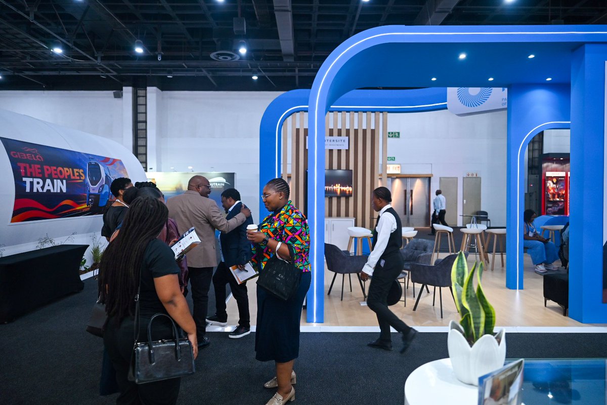 PRASA_Group's tweet photo. DAY 3 | #SARARAIL2026 🚆

The future of rail is about innovation, efficiency and an improved commuter experience!

Join us at the PRASA stand to learn more about our signalling projects and how they aim to improve train frequency and enhance the customer experience.

Today’s panel discussion features Chris Lotter, PRASA Chief Economist, and Themba Gums, Acting GM: Strategy at PRASA, sharing insights on rail’s economic impact and strategic direction.

#PRASA #PeoplesTrain #RebuildingRail #SARARAIL2026