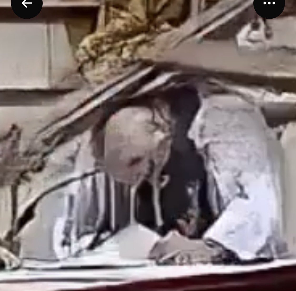 GenXtina's tweet photo. I used Grok Imagine to restore and sharpen a paused screenshot from the crucifix impact on Father Patricio Sánchez during Mass on Oct 17th, 2026. Asked it to remove compression artifacts, clarify facial features and the crucifix edges, and keep everything faithful. 
The result looked unnatural …almost demonic. 
Very unsettling.