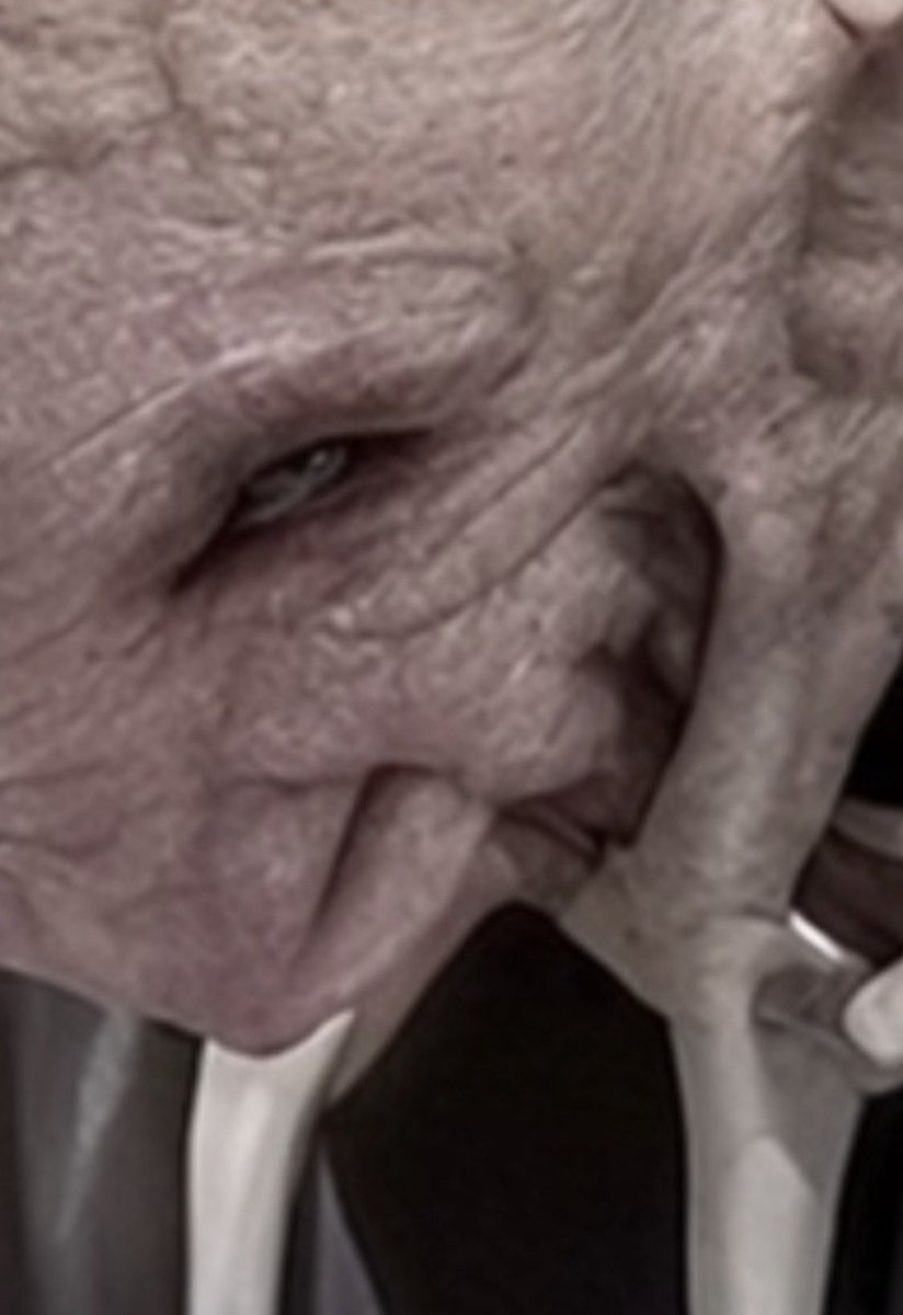 GenXtina's tweet photo. I used Grok Imagine to restore and sharpen a paused screenshot from the crucifix impact on Father Patricio Sánchez during Mass on Oct 17th, 2026. Asked it to remove compression artifacts, clarify facial features and the crucifix edges, and keep everything faithful. 
The result looked unnatural …almost demonic. 
Very unsettling.