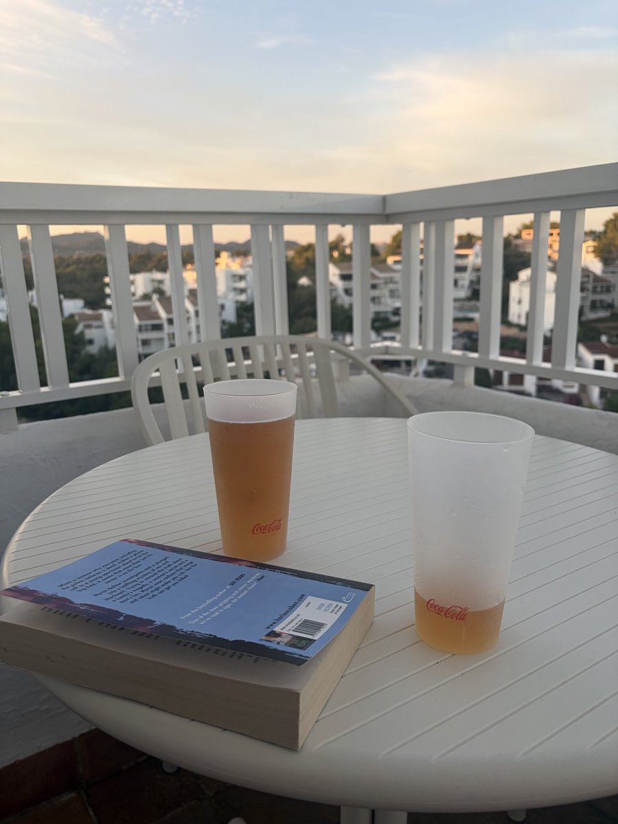Random_Penguin's tweet photo. Fave time of the day with my new literary thriller, ‘Cervezas en el Balcón’. No idea what that means but it sounds pretty damn intriguing. https://t.co/gK2a6VNSdq