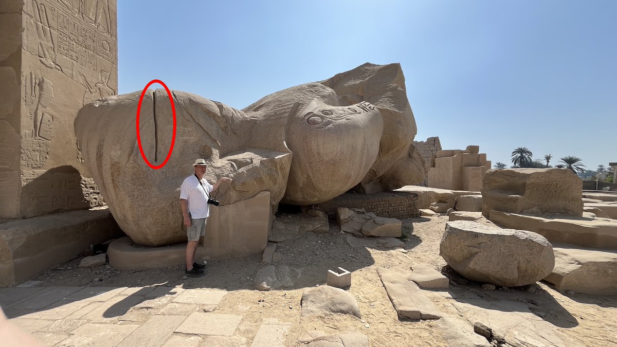 FoMaHun's tweet photo. Look at that! The dumb tourist is standing right there and doesn't even notice the huge cut in the colossal statue of Ramesses II!

So someone did cut granite after all? But who?

A. The sculptors. The head came out too big, so they tried to shrink it.

B. 👽

C. Someone later on, who wanted to chop it up and haul it off for building material.

D. ?