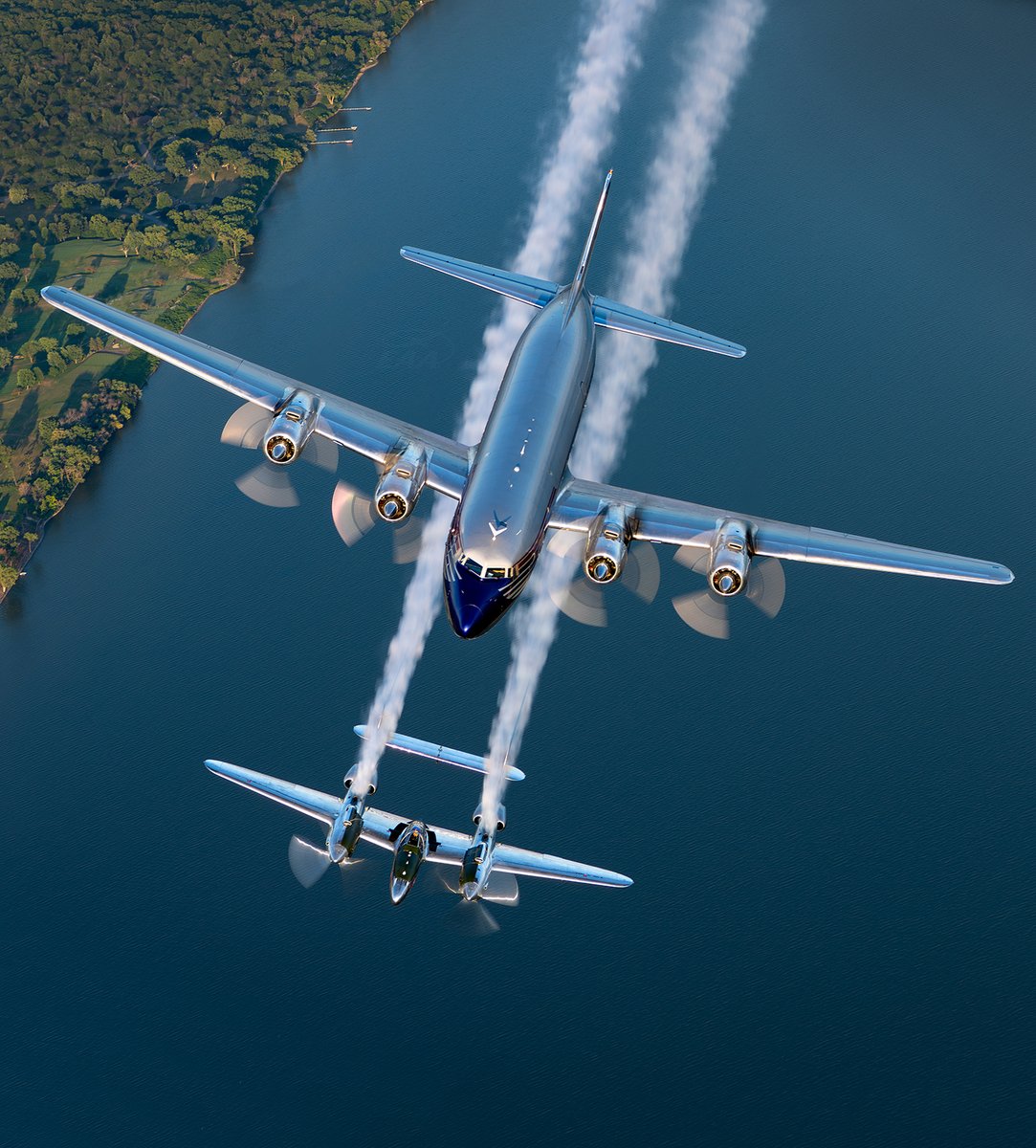 EAA's tweet photo. EAA AirVenture Oshkosh 2026 was packed with unforgettable moments, one of which was the long-awaited U.S. debut of the Flying Bulls!

Thousands of eager fans gave this group from Austria a warm Oshkosh welcome, and it was an absolute honor to see their P-38 and DC-6B in person.

Read about their journey in the November 2026 issue of Sport Aviation here: https://t.co/L5tIaNyQpP

📸 Scott Slocum
✏️ Hal Bryan

#Aviation #Avgeeks #RedBull #TheFlyingBull