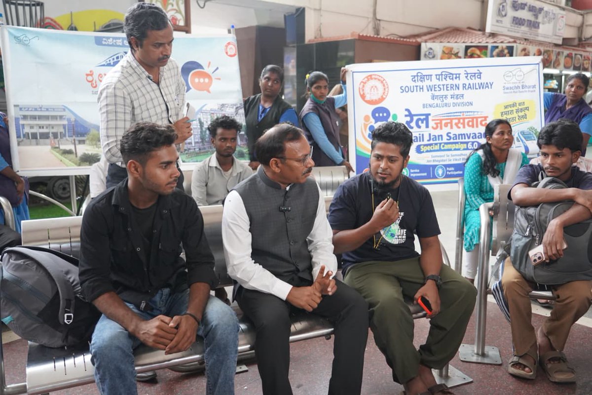 drmsbc's tweet photo. As part of Special Campaign 6.0, a Rail Jan Samvaad was conducted at KSR Bengaluru Railway Station.  Shri Ashutosh Kumar Singh, DRM/Bengaluru, along with ADRMs, interacted with passengers and gathered their valuable feedback and suggestions towards further improving hygiene, cleanliness and the quality of railway services. 
 #SpecialCampaign6.0 #RailJanSamvaad #Swachhata #SCDPM6