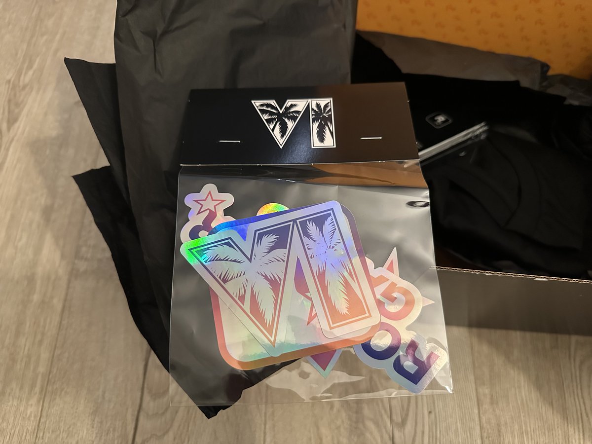 iGrandTheftAuto's tweet photo. Huge thanks to @RockstarGames for our GTA 6 merch box ❤️

Included:
• Rockstar Baseball Cap: Pink and Blue
• Grand Theft Auto VI and Rockstar Games Holographic Sticker Collection
• Grand Theft Auto VI Keychain
• Black Grand Theft Auto VI Goodtime State Tee https://t.co/7mZIJSdUgG