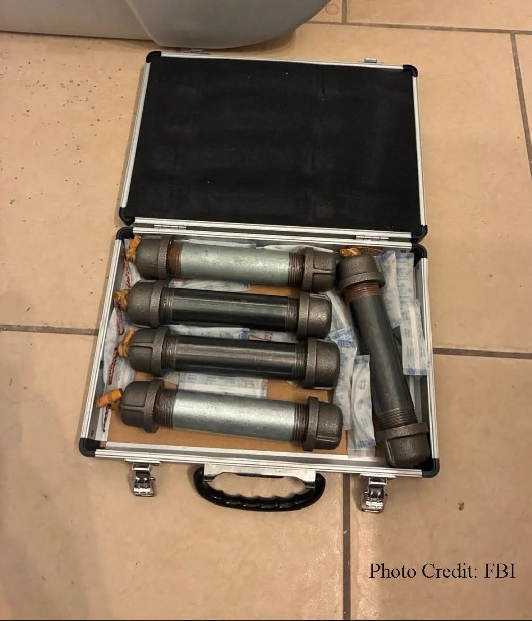 Photo of pipe bombs in a case, found at the home of Skyler Rose, charged in an attempted hate crime case.