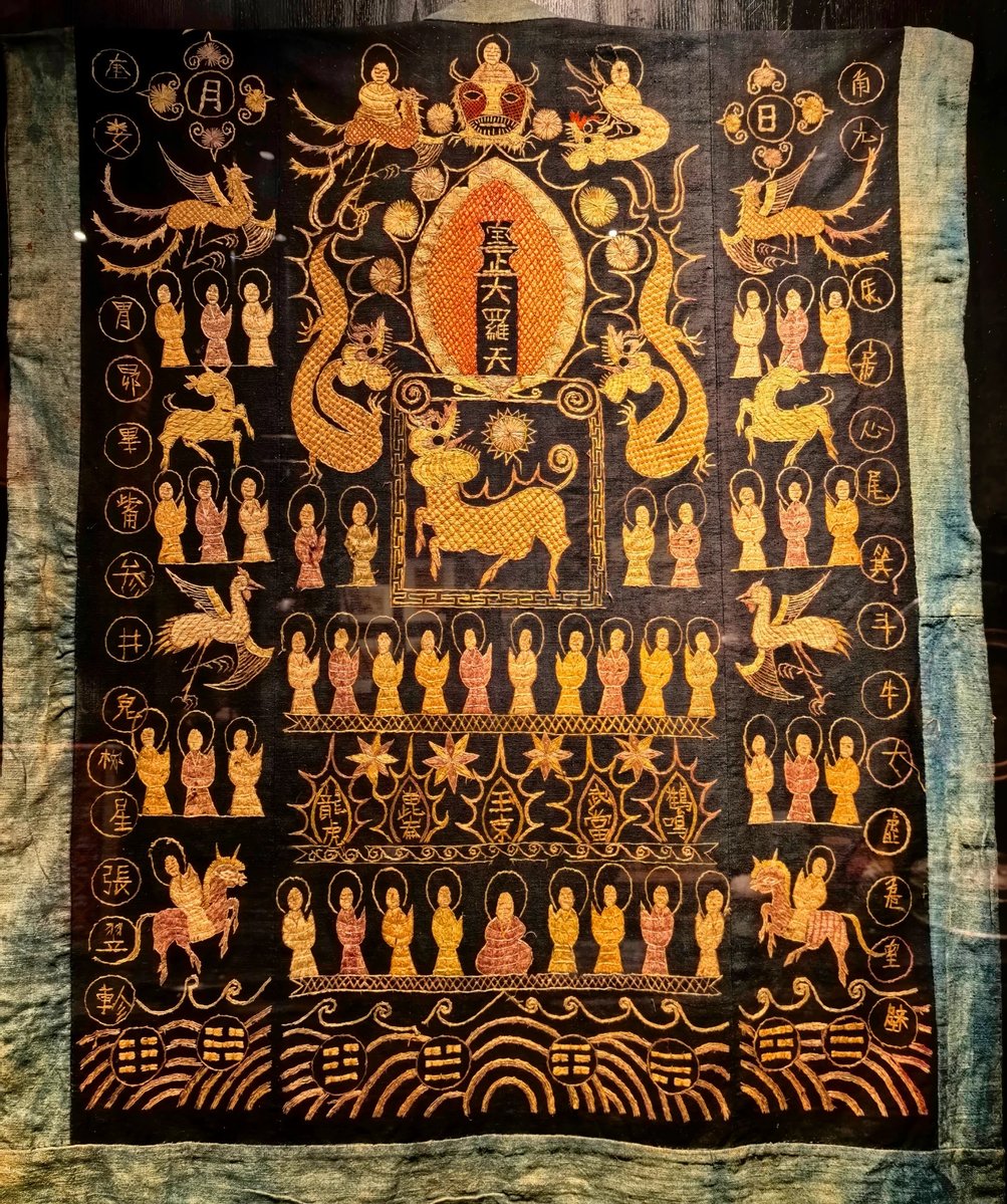 const_string3's tweet photo. A silent universe stitched by a shaman’s hands, where gods, spirits, animals, and humans share one breath. More than art, it is belief woven into fabric: a visual prayer linking heaven, earth, and the unseen. https://t.co/ogOY5E11ov
