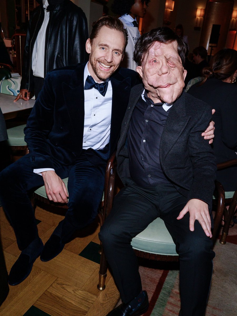 TomHFacts2's tweet photo. Before I see any hate on this amazing man next to Tom. I would like everyone to know that I have the same condition as he does, mine is invisible, his is visible we both have NF1. This man is Adam Pearson &amp; he is an extraordinary person who is an advocate for the NF1 community. https://t.co/qUFfLvJwL0