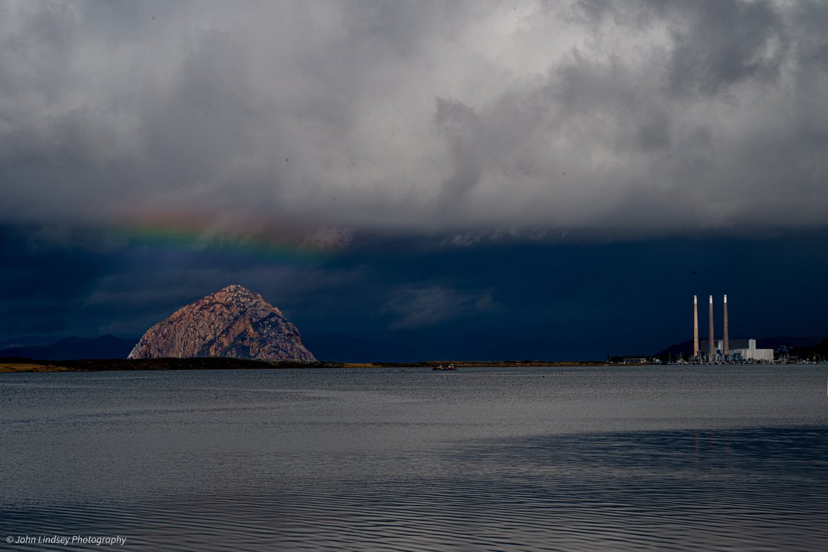 PGE_John's tweet photo. I captured this faint rainbow above Morro Rock at 11:15 a.m. today, when the sun was about 38 degrees above the horizon. At this angle, rainbows appear very low in the sky, sometimes barely peeking above the horizon.

This faint rainbow appeared as an exceptionally powerful storm continued to drench the Central Coast.

Periods of torrential rainfall will taper off tonight as a slow-moving upper-level low-pressure system, currently rotating counterclockwise off Point Sal, tracks southeastward toward the Southern California Bight.

This energetic storm certainly overperformed in terms of rainfall.

The upper-level low brought unusually cold air aloft, creating significant atmospheric instability that fueled intense convective rain showers and thunderstorms. Combined with the storm's exceptionally slow movement, these conditions allowed tremendous amounts of rainfall to accumulate across portions of the Central Coast.

The rainfall totals here in Baywood Park have been extraordinary!

As of 2:30 p.m. today, my three weather stations recorded approximately 3.5 to 3.7 inches of rainfall over a 24-hour period:

Standard rain gauge: 3.7 inches
Davis Vantage Pro2: 3.7 inches
Tempest Weather Station: 3.5 inches

Even more remarkable, at about 5 a.m., my Davis Vantage Pro2 weather station registered an instantaneous rainfall rate of 6 inches per hour! While that intensity was brief, it illustrates just how powerful some of these convective downpours became.

Thankfully, conditions will improve tonight as this slow-moving storm finally moves away from the Central Coast. What an extraordinary October storm! 🌈🌧️