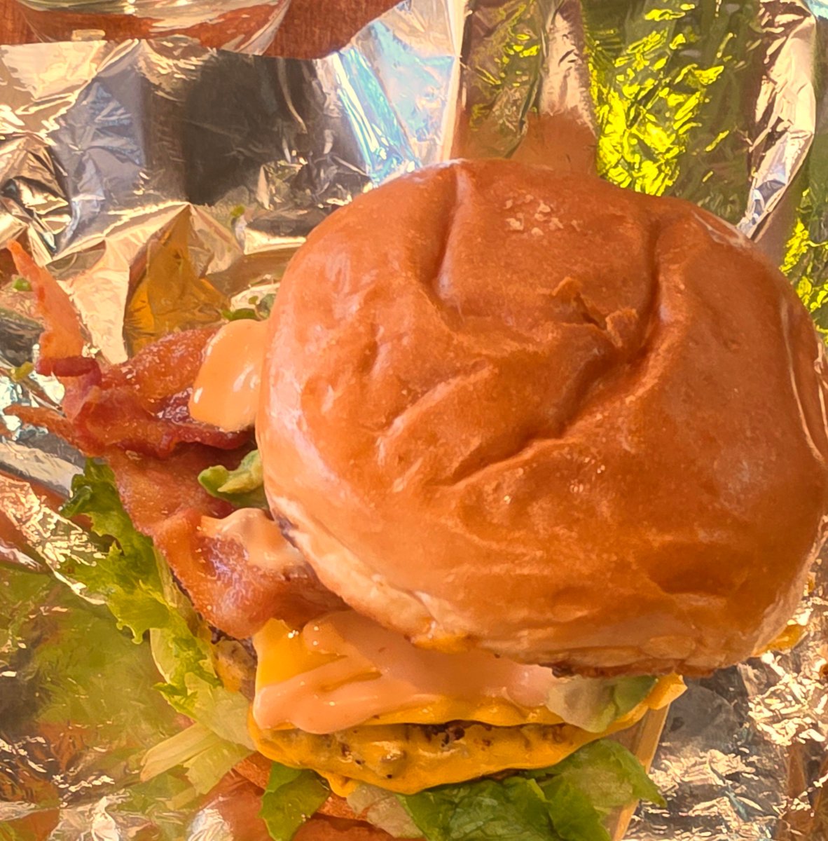 DThompsonMN's tweet photo. It is Bacon week when we play for Floyd of Rosedale! I missed a few days. I had to double up at lunch today. Bacon fries and Bacon cheeseburger! Git it! https://t.co/Vs8UA85RIX
