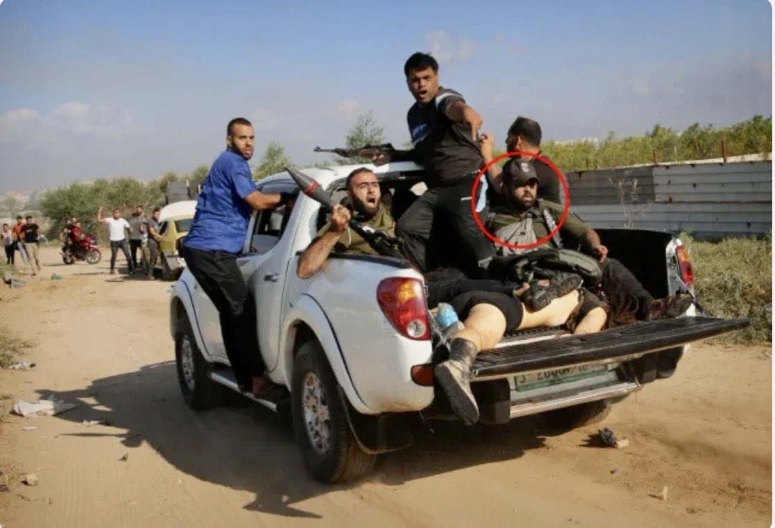 Zimmlaw175's tweet photo. If you support the “free Palestine” movement, know exactly what you are supporting. Take a good at this photo. That’s the “brave Palestinian freedom fighters” parading the body of an innocent young girl they just murdered at a music festival. They are savages, murderers, gang rapists and pure evil. Would you also support the SS, because the so-called “Palestinians” actually committed even worse atrocities than the Nazis.