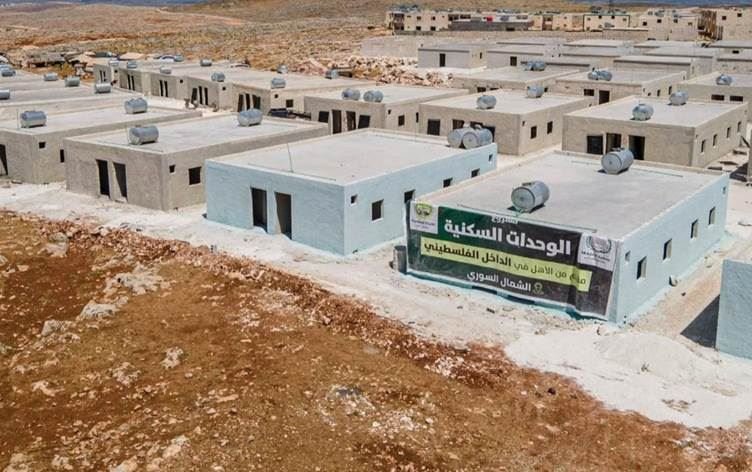 Kurdistan_AR's tweet photo. Turkey has built dozens of settlements in the Kurdish region of Afrin after displacing its Kurdish inhabitants in 2018. Following their displacement, it began building settlements to house Arabs, with Palestinian, Kuwaiti, Qatari, and other Arab organizations reportedly contributing to the funding of these projects, as you can see.

All of this has happened—and continues to happen—in full view of the entire world, with documented evidence. Yet, hardly anyone speaks out about these crimes or holds those responsible accountable!