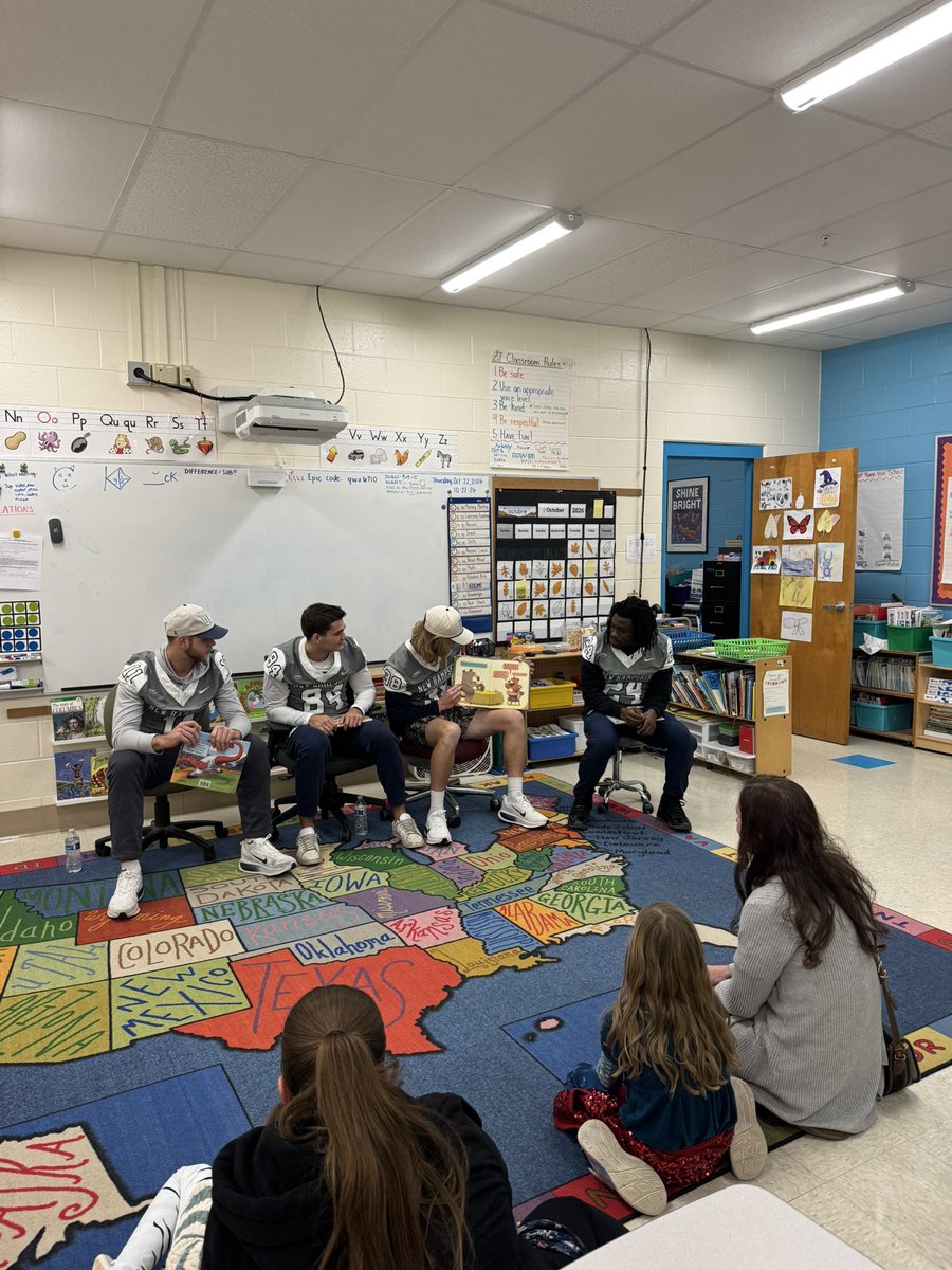 UNH_Football's tweet photo. Our ‘Cats love giving back to our community! We had a great time reading with the students at Garrison Elementary. Thank you for having us!!💙😼 Go ‘Cats!

@kennebunksavings 

#FastPhysicalRelentless #WildcatsCARE https://t.co/OpKQscGMuL