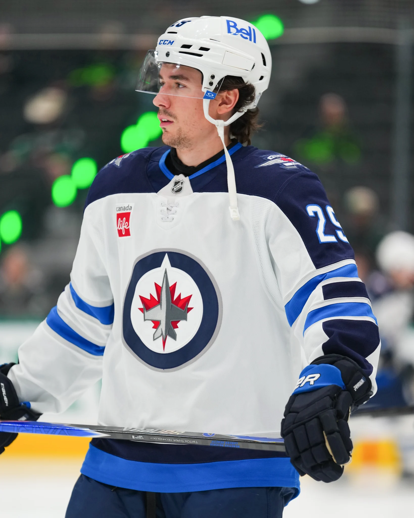 Brayden Yager warming up on ice in a Jets uniform.