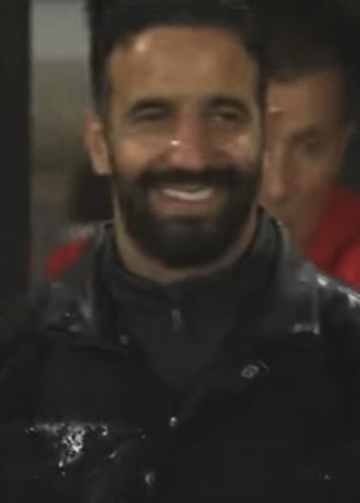 PolymarketSport's tweet photo. 🚨Ruben Amorim’s reaction to Bournemouth fans chanting “Ruben Amorim, it’s happening again” after Milan went 3-0 down

Bournemouth also beat Manchester United 3-0 when he was in charge https://t.co/QFbm37MwwT